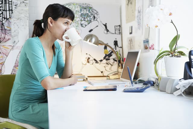 woman in front of laptop at home